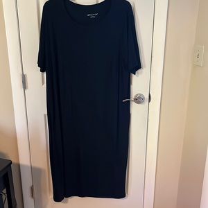 Black tshirt dress. Never worn. No tag. Long. Short sleeves